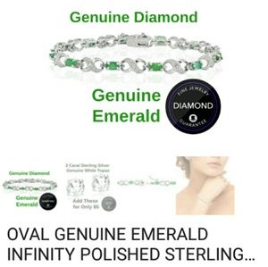 Stamped Sterling gen. emerald tennis bracelet